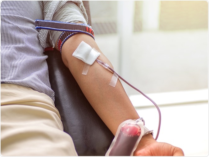 Blood donor at donation. Image Credit: May Preechaya / Shutterstock